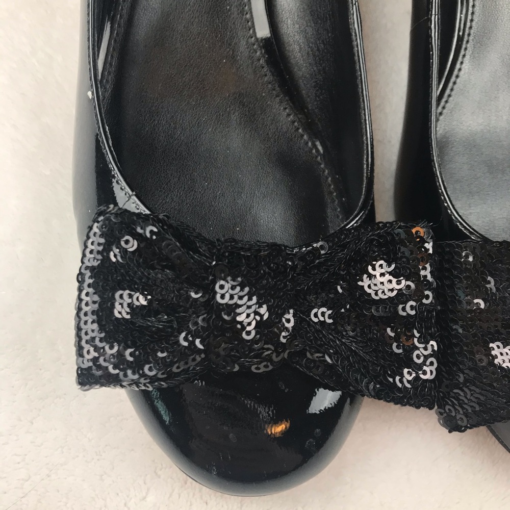 Michael Kors black patent leather sequence bows